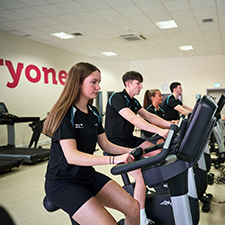 people on the exercise machines