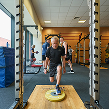 person using a barbell