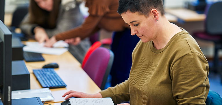 student on computer