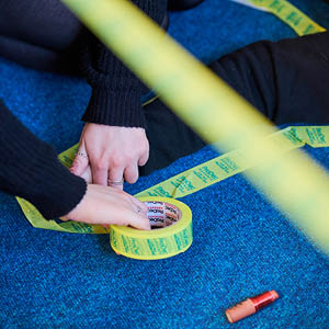 student using crime scene tape