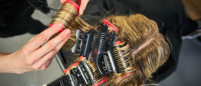 close up of hair being cut