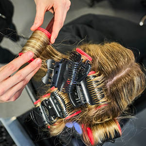 close up of hair being cut