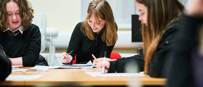 students having a discussion in class