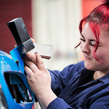 student paint matching a car