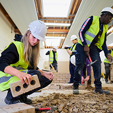 student bricklaying