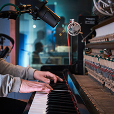 student in an audio eng lab